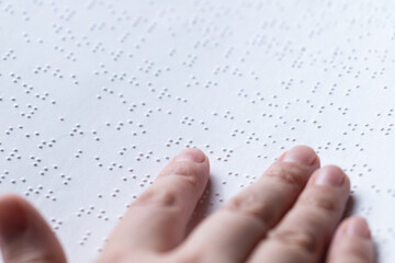 Reading a book in Braille