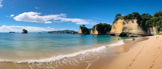 Fotobehang serene cathedral cove panorama: empty beach in summer sunlight © Ashi
