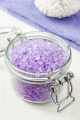 Glass jar with purple lavender crystal bath salt (foot soak). Homemade pedicure, spa and beauty...
