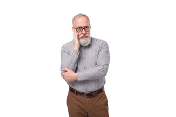 60 year old elderly business man with mustache and gray beard wearing glasses looks stylish and...