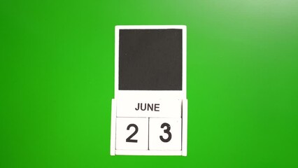 Calendar with the date June 23 on a green background. Illustration for an event of a certain date.