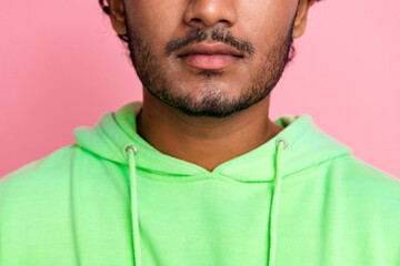 Closeup cropped photo of confident young indian man wear green sweatshirt unshaven model for...
