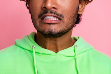 Close up cropped photo of young man with unshaven stubble toothy nervous panic worried before date isolated on pink color background