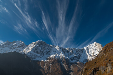 View of Tengkangboche mountain during trekking from Namche Bazar to Thame in a clear day. Three...