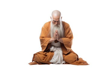 Old Shaolin Monk with white beard praying with orange tunic sitting on the ground on a cutout PNG transparent background