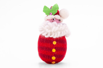 knitted handmade Christmas decoration isolated on white
