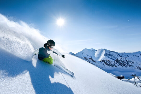 wonderful skiing in perfect powder snow condition in the Alps on a sunny day.