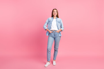 Full body photo of attractive young woman look empty space defile dressed stylish denim clothes...