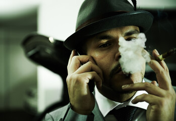 Man, gangster and phone call while smoking or planning mafia, danger or ransom abduction. Male...