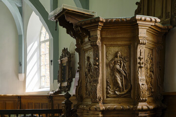 The wooden pulpit with the seven cardinal virtues from 1759 in the Mariakerk in Beers Friesland The Netherlands. The church itself dates from the 13th century