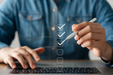 Business performance monitoring concept, businessman using laptop Online survey filling out,...