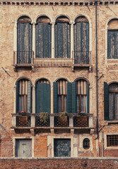 Antique windows with wooden shutters, Venice