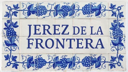 Fotobehang Jerez de la Frontera on Frame of Azulejos (name of Spanish tiles) with blue bunches of grapes © Brad Pict
