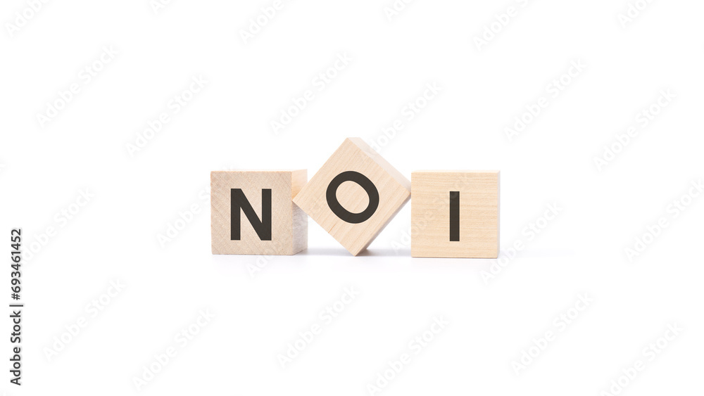 Poster three wooden blocks with the text noi - an abbreviation for net operating income. white background