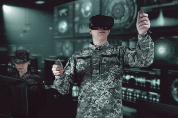 Warfare pilot using head-mounted displays VR glasses, digital device operating with robot, drone or troops of mechanical soldiers. The military's training virtual simulators, AI technology - obrazy, fototapety, plakaty