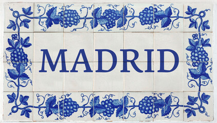 Madrid on Frame of Azulejos (name of Spanish tiles) with blue bunches of grapes