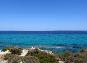 Fototapeta na wymiar Panorama of white rocks, blue sky and blue sea. Summer concept.