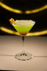 Alcoholic cocktail on a black background. Concept of cocktails and alcohol