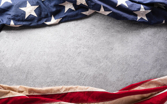 Happy Presidents day concept made from American flag and the text on dark stone background.