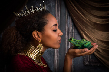 African princess kissing frog - obrazy, fototapety, plakaty