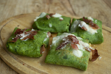 spinach crepes with speck