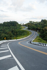 Beautiful curved road look like number 3 on the high mountain in Nan province, Thailand. An iconic...