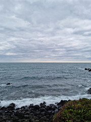 
This is a Jeju Island beach with basalt rocks.