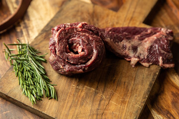 Raw skirt, steak with rosemary and thyme