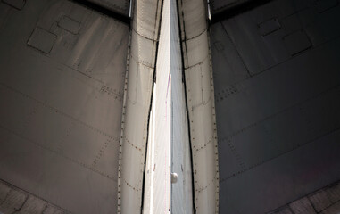 technical aviation background fragment of an airplane wings