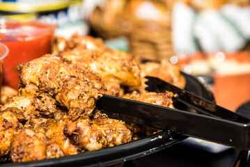 Chicken wings on a catering spread