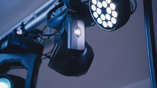 A device for lighting effect used at concerts. Night club or other event, concert. Spotlights of light music.