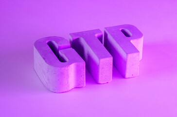 GTP word written in concrete letters with illuminating vibrant colos. Artificial intelligence idea.