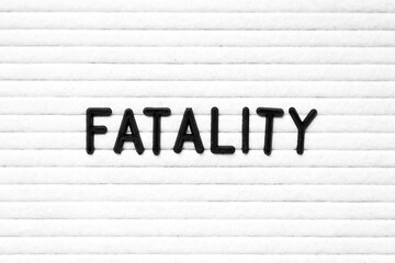 Black color letter in word fatality on white felt board background