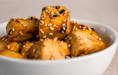 Sesame, glazed tofu, with toasted sesame seeds