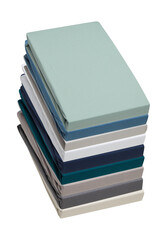 Pile of fabric in various colors cut out isolated transparent background
