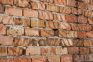 Old brickwall with visible thick layer of mortar close up shot for industrial background.