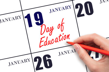 January 19. Hand writing text Day of Education on calendar date. Save the date.