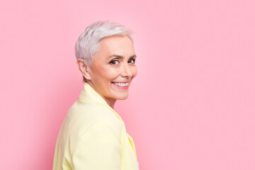 Close up photo of cheerful old businesswoman white short hair in yellow jacket smiling glad to see...