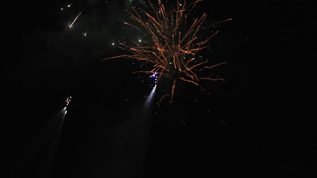 flyboarding against the background of fireworks in the night sky, fireworks show