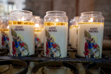 Candles Saint Michel inside of the Basilica of Sacré Coeur de Montmartre, Paris, France.