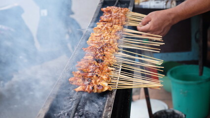 chicken satay on the grill