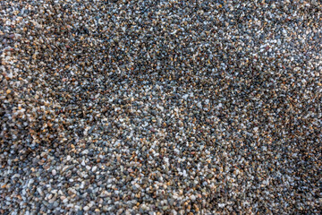 Close up view of rough sand on the beach.