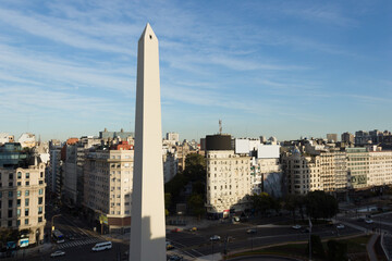 Aerial view of downtown Buenos Aires, Argentina. The iconic Obelisk is illuminated by the sunrise