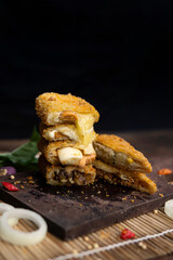 risoles filled with various variants, indonesian food, coating with bread crumb, decorated with condiment and garnish.