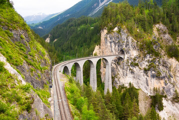 Swiss viaduct in mountain, scenic ride