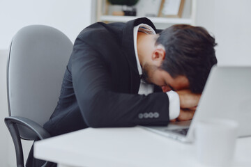 Job man thinking laptop glasses office tired angry desk working business adult sitting