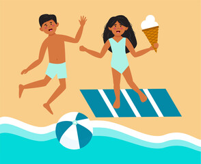Children with ice-cream and ball. Girl and boy jumping on the beach next to sea on vacations.