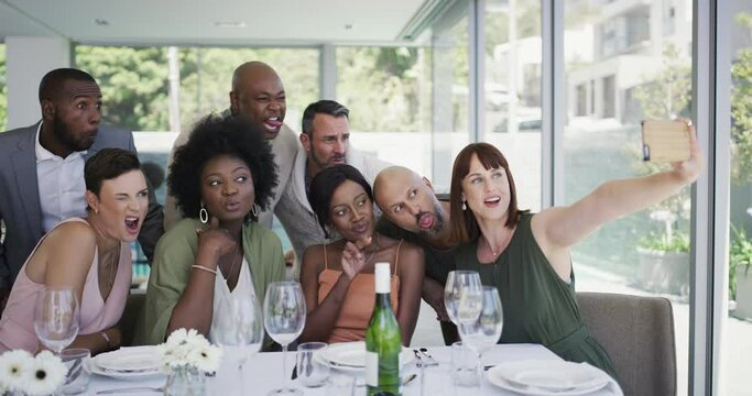 Business people, diversity and funny selfie at restaurant in teamwork or collaboration at office together. Group of diverse employees smile with silly faces, fun picture or team unity at dinner table