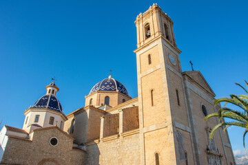 Picturesque blue and white domes, tiled with glazed ceramics of the church of La Mare de Deu del...