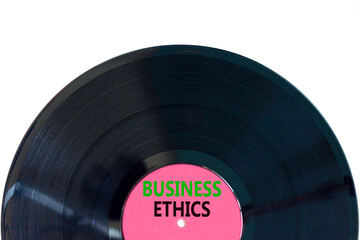 Business ethics symbol. Concept words Business ethics on beautiful black vinyl disk. Beautiful...